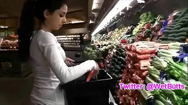 أنبوب جديد Teenage playing with carrot on the market غرامة