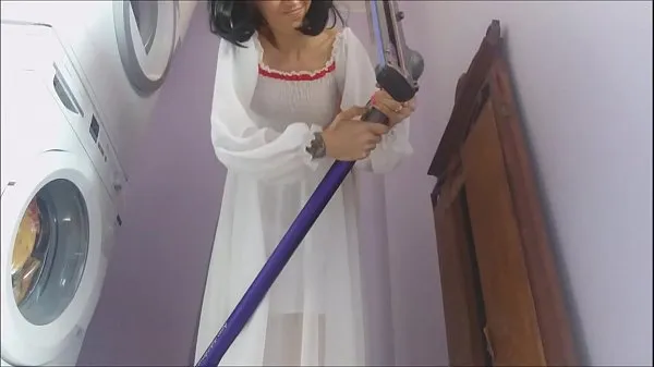 Nieuwe Chantal is a good housewife but sometimes she lingers too much with the vacuum cleaner fijne Tube
