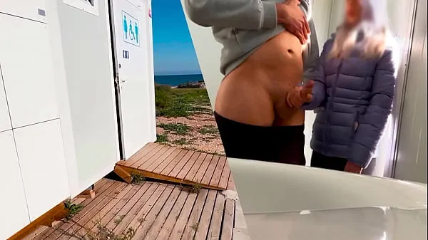 Baru I surprise a girl who catches me jerking off in a public bathroom on the beach and helps me finish cumming tiub halus